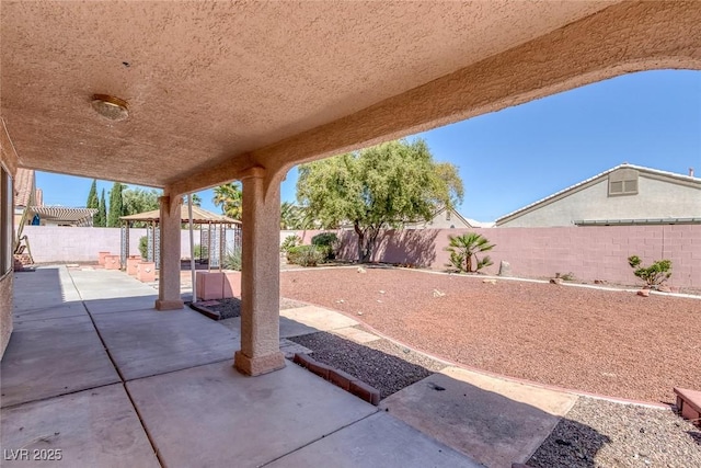 5808 Spinnaker Reach Ave, Las Vegas, NV 89130 - fenced backyard with a patio and a gazebo