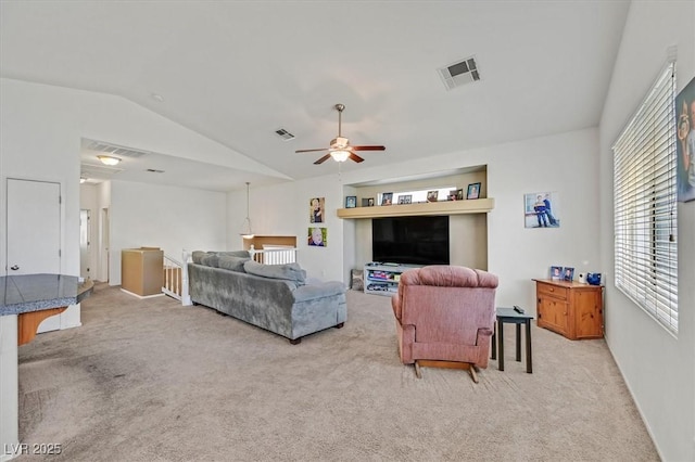 9105 White Eyes Ave, Las Vegas, NV 89143 - living room with vaulted ceiling, light colored carpet, and ceiling fan