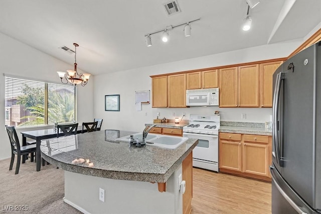 9105 White Eyes Ave, Las Vegas, NV 89143 - kitchen featuring white appliances, a chandelier, a center island, decorative light fixtures, and a kitchen bar