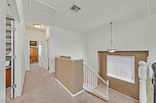 9105 White Eyes Ave, Las Vegas, NV 89143 - corridor with attic access, an upstairs landing, and carpet floors