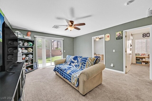 9105 White Eyes Ave, Las Vegas, NV 89143 - living area featuring carpet flooring and a ceiling fan