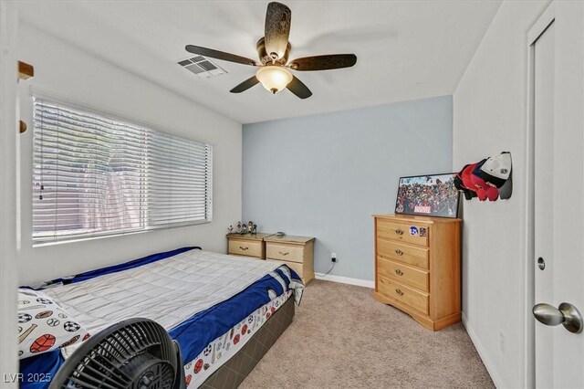 9105 White Eyes Ave, Las Vegas, NV 89143 - bedroom with light carpet and a ceiling fan