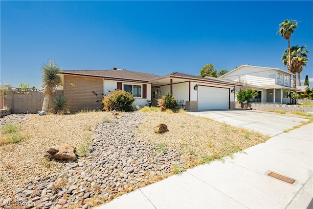7701 Pheasant Ln, Las Vegas, NV 89145 - ranch-style home featuring a garage and concrete driveway