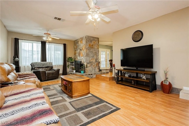 7701 Pheasant Ln, Las Vegas, NV 89145 - living room with a ceiling fan and light wood-style flooring