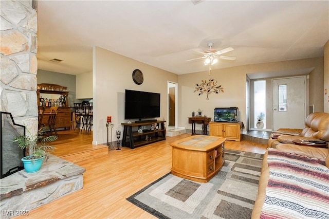 7701 Pheasant Ln, Las Vegas, NV 89145 - living room with light wood finished floors and a ceiling fan