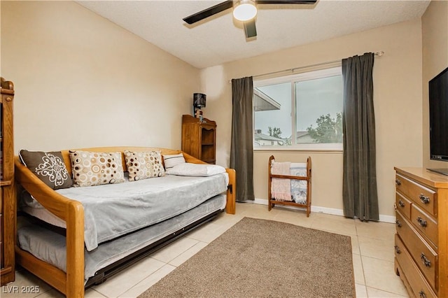 7701 Pheasant Ln, Las Vegas, NV 89145 - bedroom with light tile patterned floors, ceiling fan, and baseboards