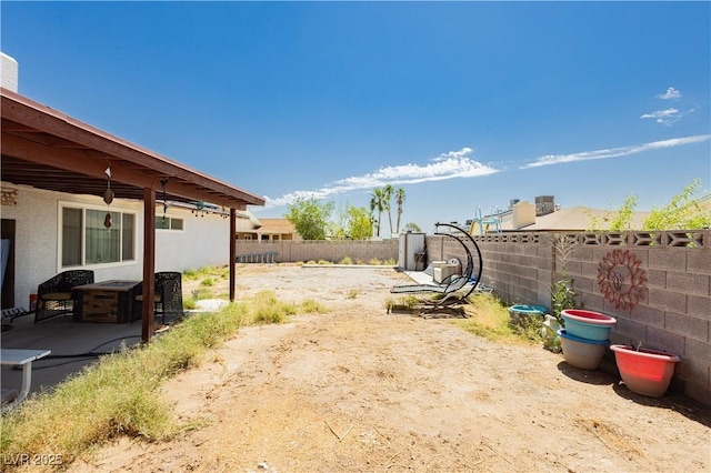 7701 Pheasant Ln, Las Vegas, NV 89145 - fenced backyard featuring a patio area