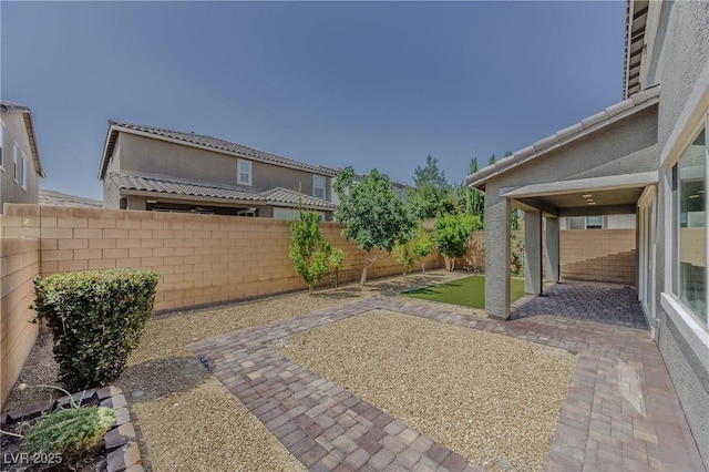 6403 Ava Ridge Ave, Las Vegas, NV 89141 - fenced backyard featuring a patio area