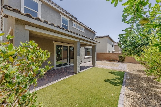 6403 Ava Ridge Ave, Las Vegas, NV 89141 - rear view of house featuring stucco siding and a patio