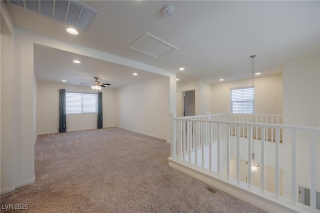 6403 Ava Ridge Ave, Las Vegas, NV 89141 - empty room featuring carpet floors, healthy amount of natural light, recessed lighting, baseboards, and a ceiling fan