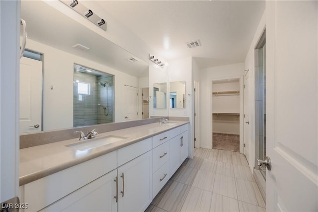6403 Ava Ridge Ave, Las Vegas, NV 89141 - full bathroom with a stall shower, double vanity, a spacious closet, and tile patterned floors