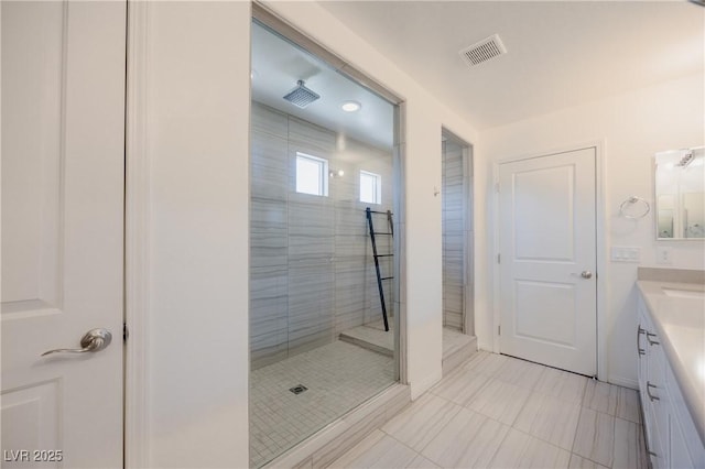 6403 Ava Ridge Ave, Las Vegas, NV 89141 - bathroom with vanity, a tile shower, and tile patterned floors