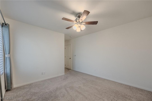 6403 Ava Ridge Ave, Las Vegas, NV 89141 - spare room with light colored carpet, a ceiling fan, and baseboards