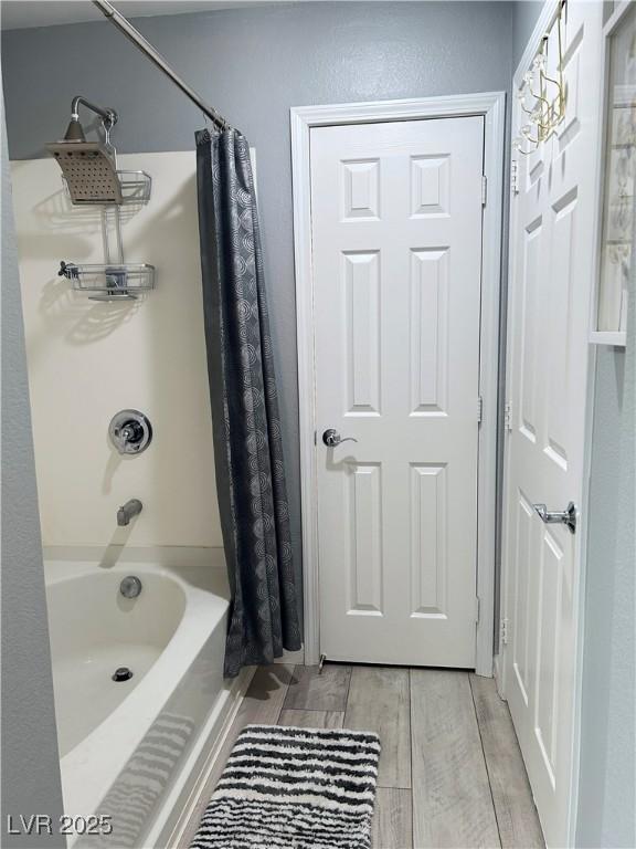 23 E Agate Ave Unit 301, Las Vegas, NV 89123 - full bathroom with shower / bath combination with curtain and wood finished floors
