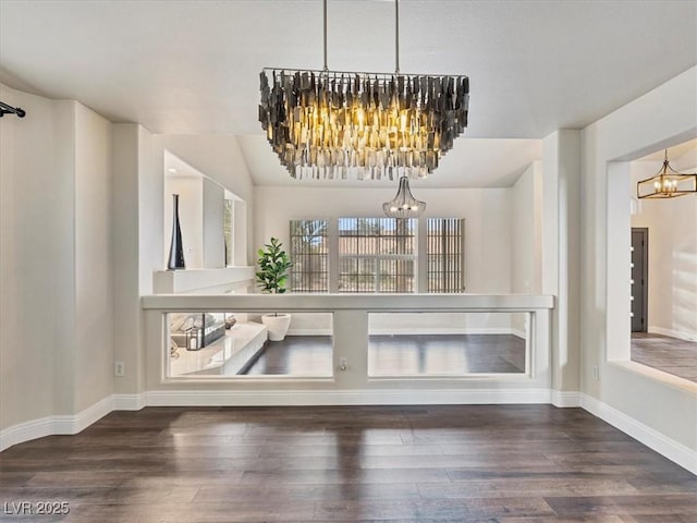 6639 Tranquil Seas Ct, Las Vegas, NV 89139 - foyer entrance with a chandelier, wood finished floors, and baseboards