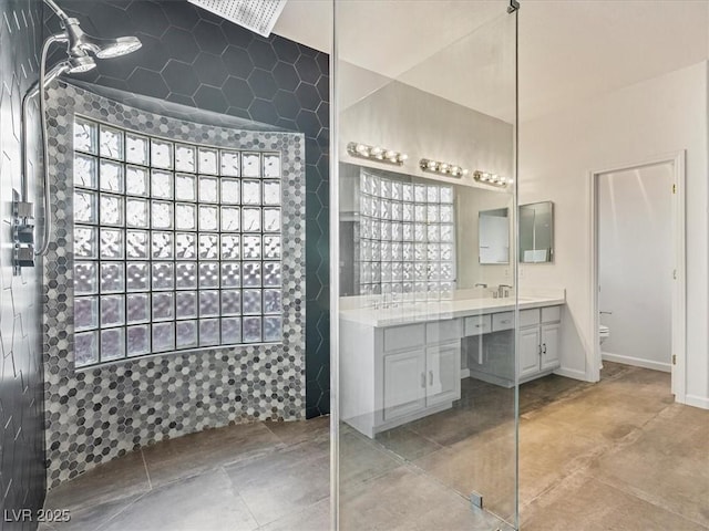 6639 Tranquil Seas Ct, Las Vegas, NV 89139 - full bathroom featuring vanity, a walk in shower, and toilet