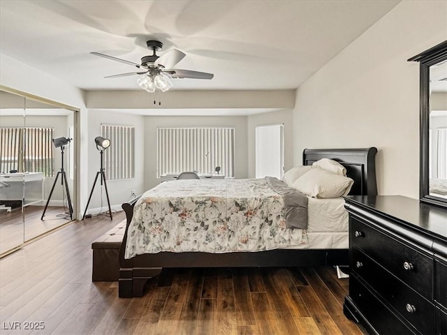 6639 Tranquil Seas Ct, Las Vegas, NV 89139 - bedroom with dark wood-type flooring, ceiling fan, and a closet