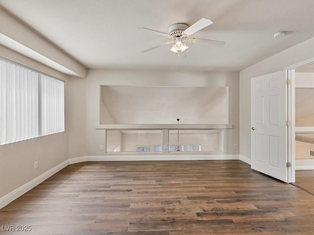 6639 Tranquil Seas Ct, Las Vegas, NV 89139 - empty room featuring a ceiling fan, wood finished floors, baseboards, and a smoke detector