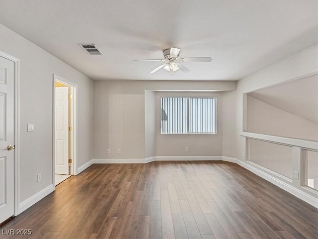 6639 Tranquil Seas Ct, Las Vegas, NV 89139 - unfurnished room with ceiling fan, dark wood finished floors, and baseboards