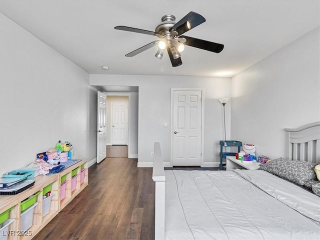 6639 Tranquil Seas Ct, Las Vegas, NV 89139 - bedroom with wood finished floors, baseboards, and a ceiling fan