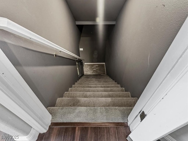 6639 Tranquil Seas Ct, Las Vegas, NV 89139 - staircase featuring wood finished floors