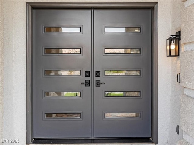 6639 Tranquil Seas Ct, Las Vegas, NV 89139 - property entrance featuring stucco siding
