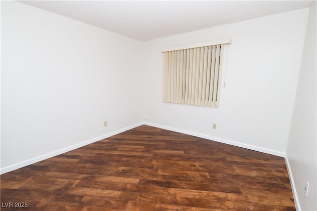 3811 Desert Marina Dr Unit 125, Laughlin, NV 89029 - unfurnished room featuring dark wood finished floors and baseboards