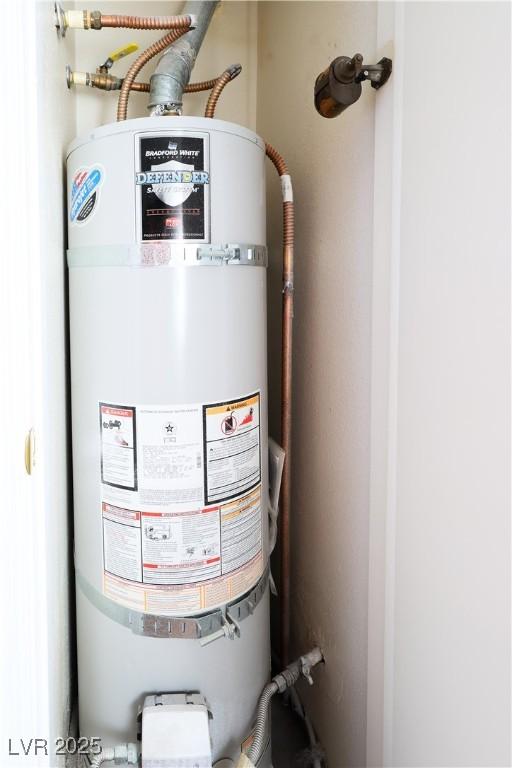 3811 Desert Marina Dr Unit 125, Laughlin, NV 89029 - utility room with strapped water heater