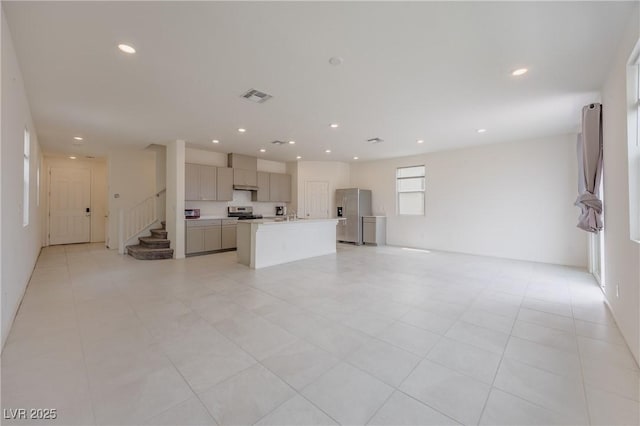 5927 Coja St, Las Vegas, NV 89113 - unfurnished living room featuring recessed lighting, stairway, and light tile patterned floors