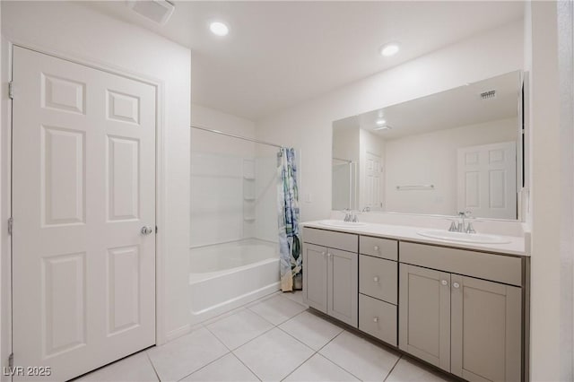 5927 Coja St, Las Vegas, NV 89113 - full bathroom featuring tile patterned floors, double vanity, shower / bath combo, and recessed lighting