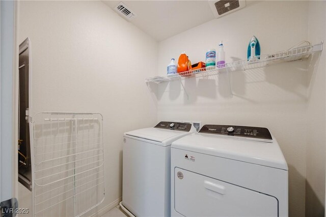 5927 Coja St, Las Vegas, NV 89113 - laundry room featuring separate washer and dryer