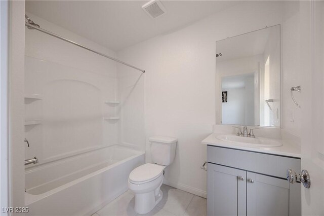 5927 Coja St, Las Vegas, NV 89113 - bathroom featuring vanity, toilet, bathtub / shower combination, tile patterned flooring, and baseboards