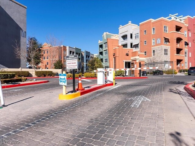 38 E Serene Ave Unit 134, Las Vegas, NV 89123 - view of street with curbs and a gated entry