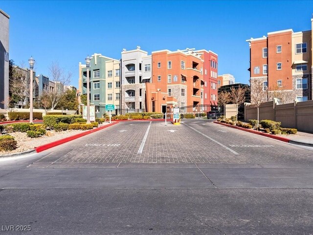 38 E Serene Ave Unit 134, Las Vegas, NV 89123 - view of property featuring uncovered parking