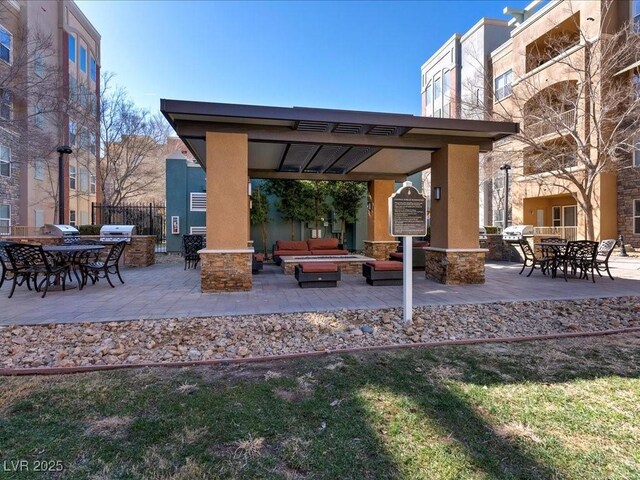 38 E Serene Ave Unit 134, Las Vegas, NV 89123 - view of patio featuring outdoor lounge area and grilling area