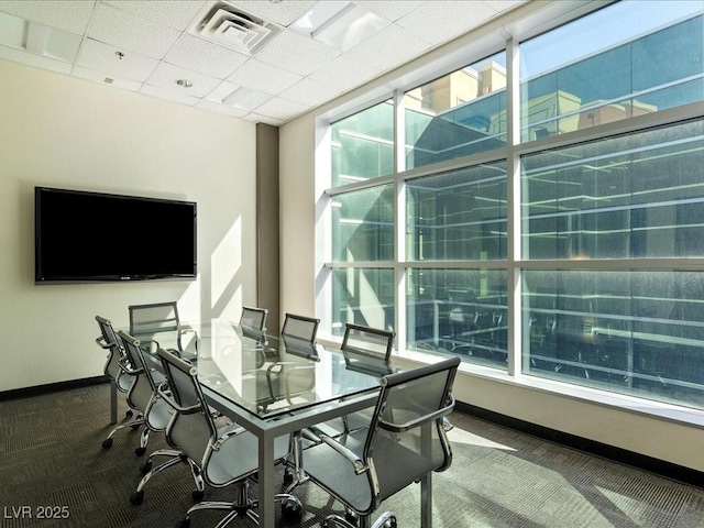38 E Serene Ave Unit 134, Las Vegas, NV 89123 - carpeted dining room with baseboards, a paneled ceiling, and an office area