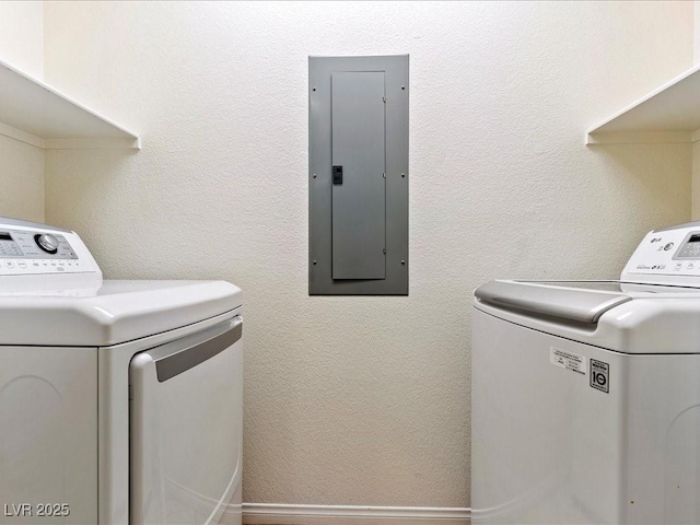 38 E Serene Ave Unit 134, Las Vegas, NV 89123 - laundry area with electric panel and washer and clothes dryer
