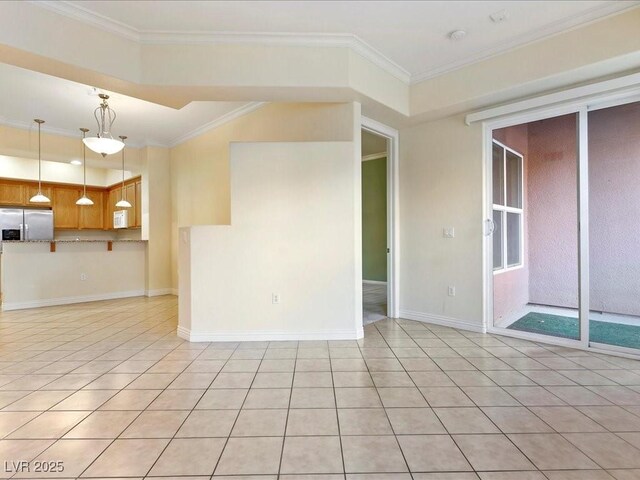 38 E Serene Ave Unit 134, Las Vegas, NV 89123 - spare room with light tile patterned floors, ornamental molding, and baseboards