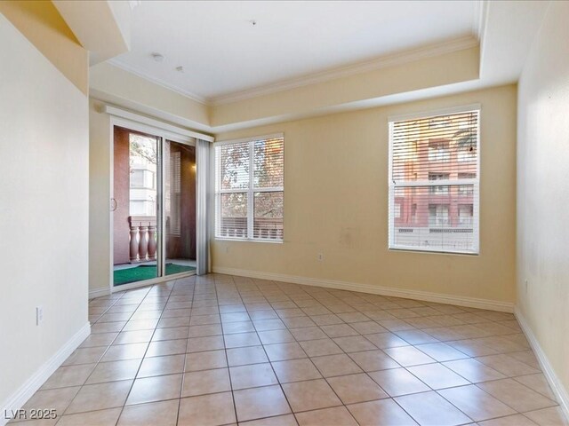 38 E Serene Ave Unit 134, Las Vegas, NV 89123 - empty room featuring ornamental molding, light tile patterned flooring, and baseboards