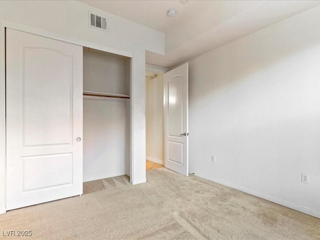 38 E Serene Ave Unit 134, Las Vegas, NV 89123 - unfurnished bedroom with light colored carpet, a closet, and baseboards