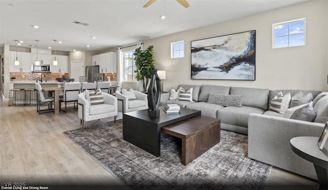 2615 Regency Cove Ct Lot 13, Las Vegas, NV 89121 - living area with light wood-style floors, a ceiling fan, and recessed lighting