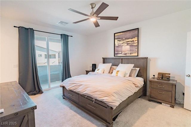 9934 Iron Creek Ave, Las Vegas, NV 89178 - bedroom with light colored carpet, access to outside, and ceiling fan