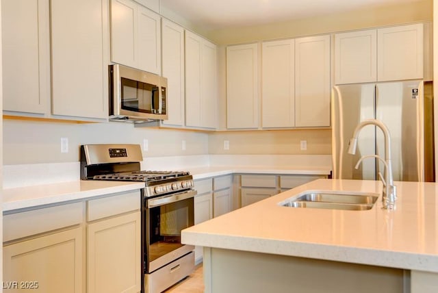 11840 Pelican Butte Ave, Las Vegas, NV 89138 - kitchen featuring stainless steel appliances, a sink, and white cabinets