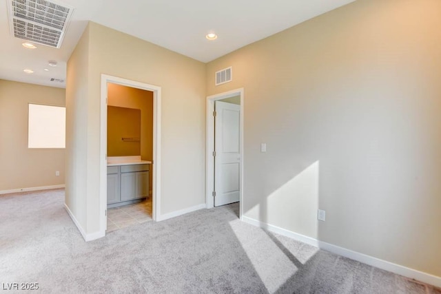 11840 Pelican Butte Ave, Las Vegas, NV 89138 - spare room featuring light carpet, baseboards, and recessed lighting