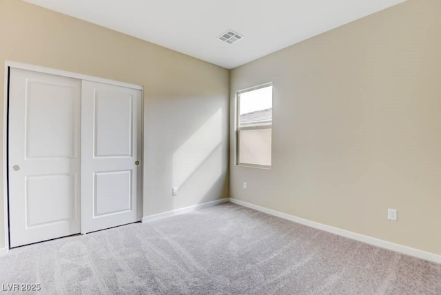 11840 Pelican Butte Ave, Las Vegas, NV 89138 - unfurnished bedroom with carpet floors, baseboards, and a closet