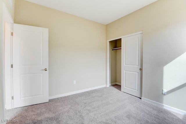 11840 Pelican Butte Ave, Las Vegas, NV 89138 - unfurnished bedroom with carpet flooring, a closet, and baseboards