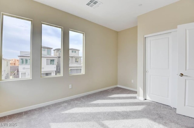 11840 Pelican Butte Ave, Las Vegas, NV 89138 - unfurnished bedroom with carpet floors, baseboards, and a closet