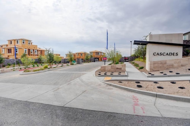 11840 Pelican Butte Ave, Las Vegas, NV 89138 - view of concrete street featuring curbs, a residential view, and sidewalks