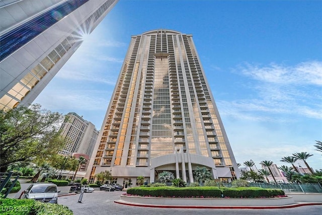135 E Harmon Ave Unit 1403, Las Vegas, NV 89109 - view of property featuring uncovered parking