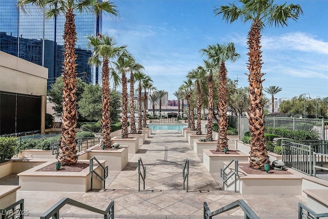 135 E Harmon Ave Unit 1403, Las Vegas, NV 89109 - surrounding community featuring a swimming pool and a patio area